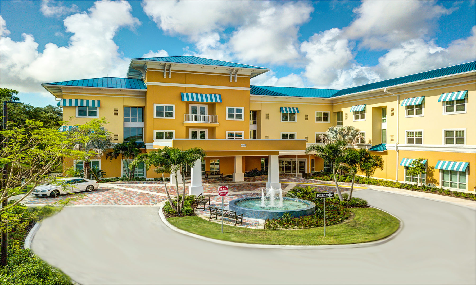 a building with a fountain in front of it