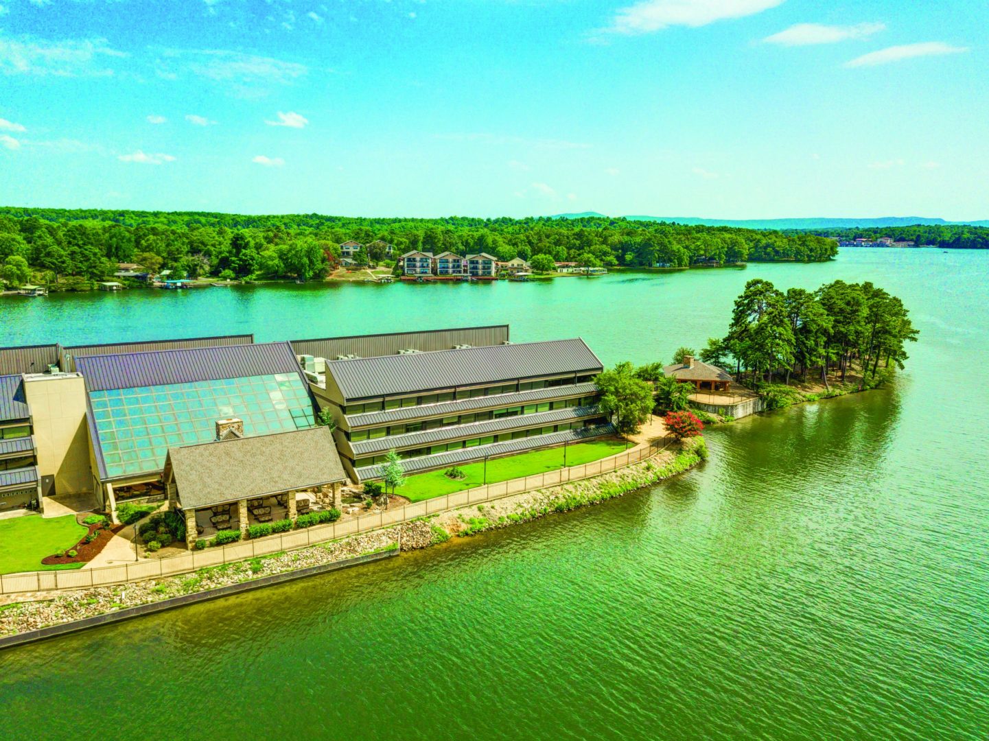 a building next to a body of water