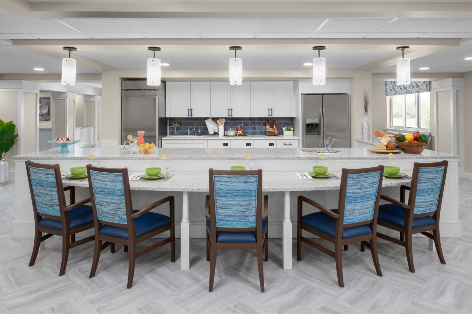 a kitchen with a large table and chairs