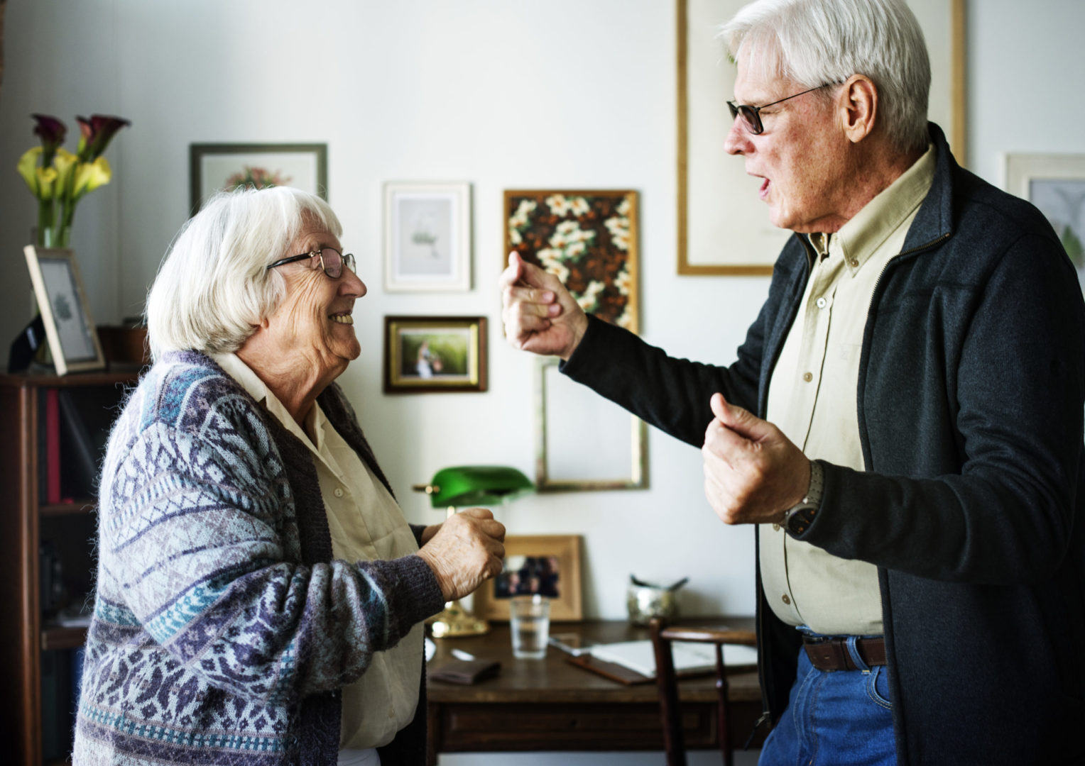 a person and person standing in a room