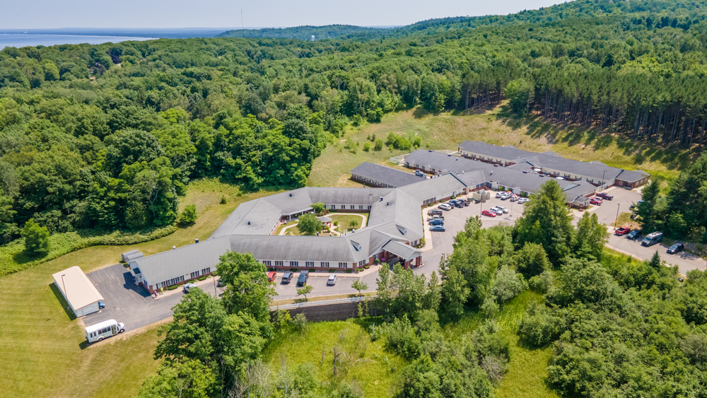 a building surrounded by trees