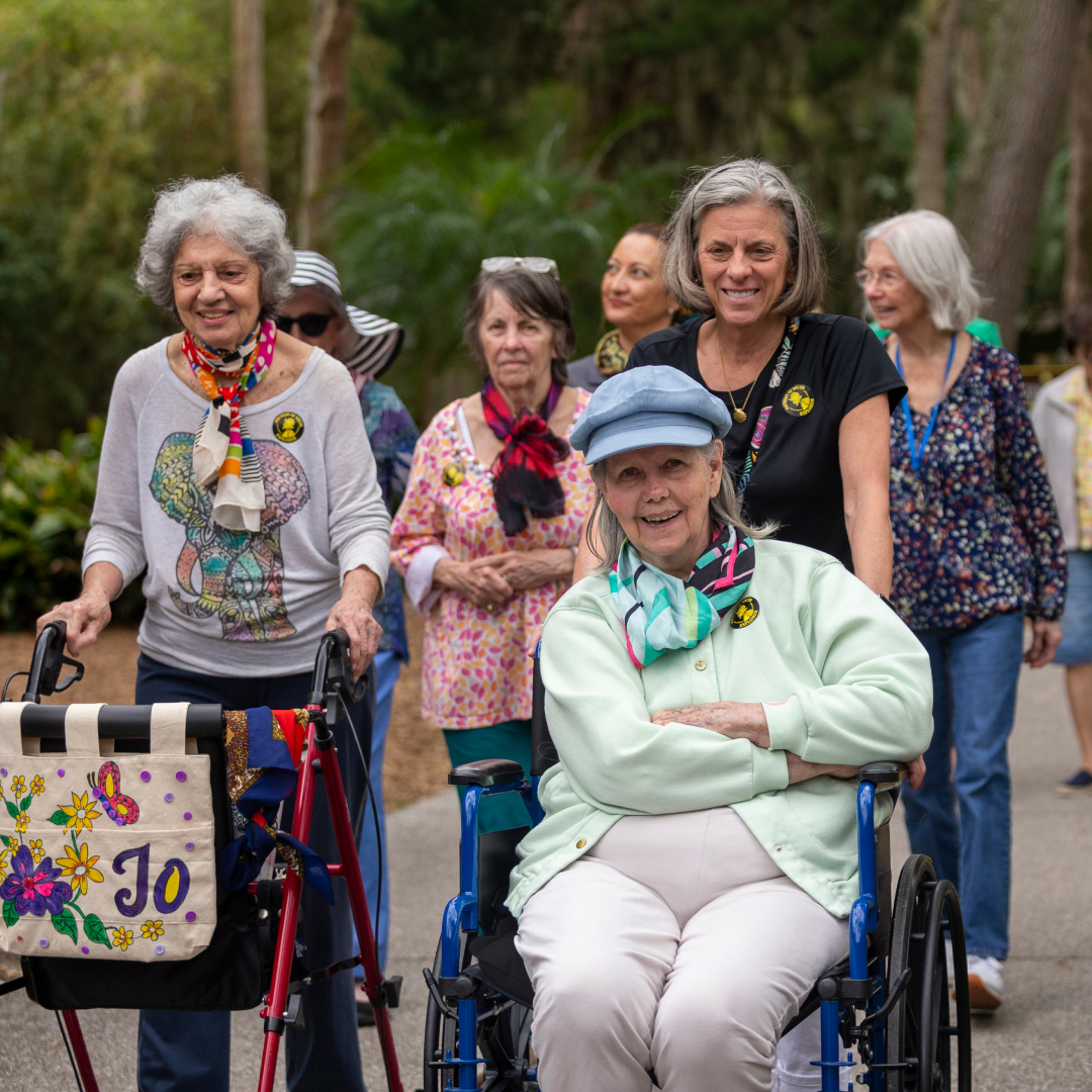 a group of older women in wheelchairs