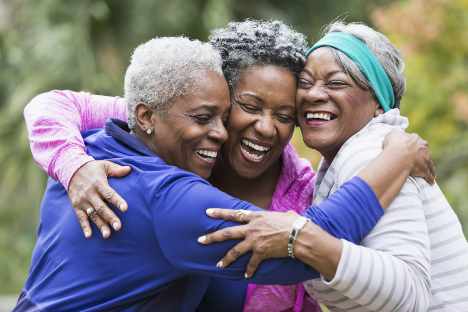 a group of women hugging