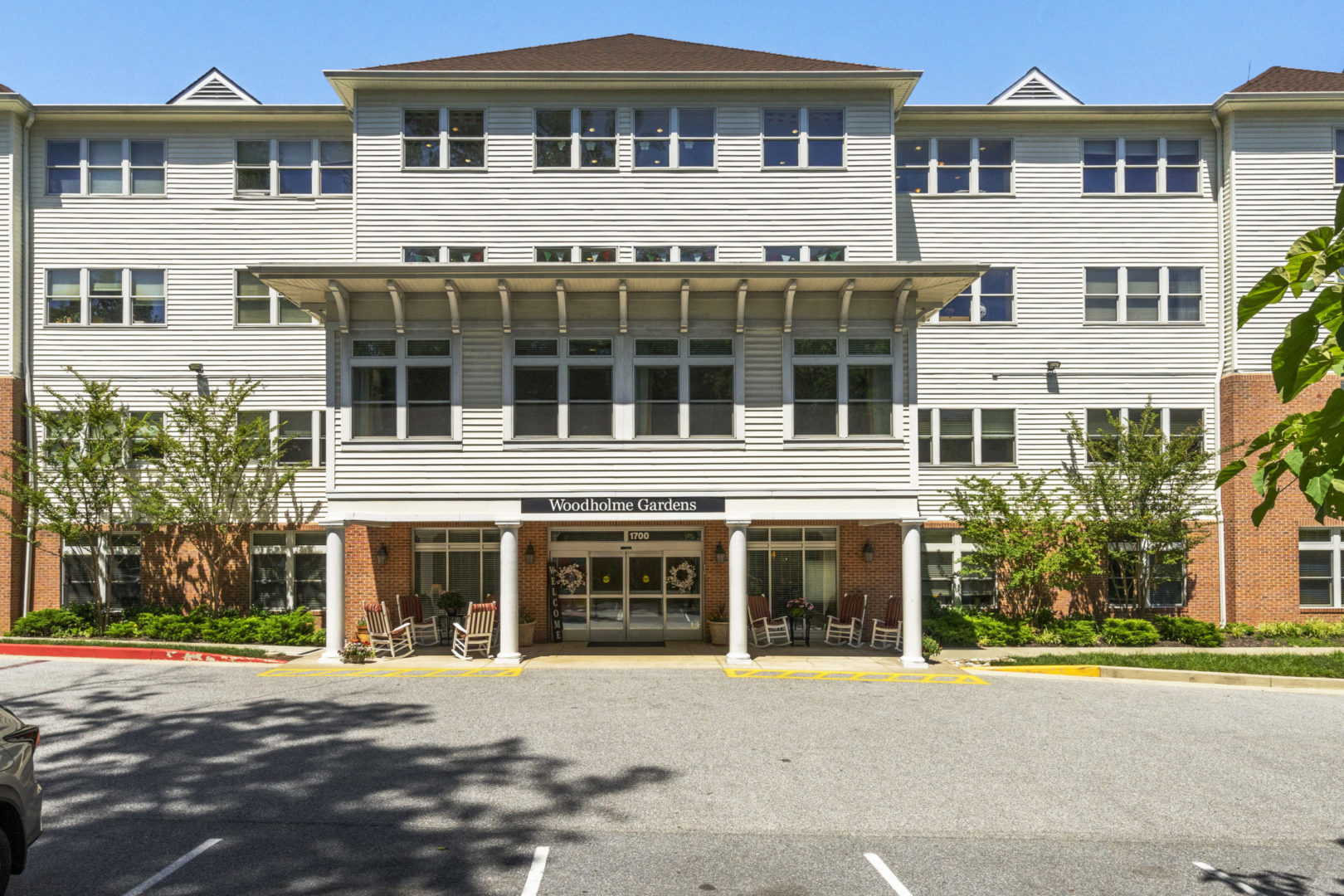 a large building with a parking lot