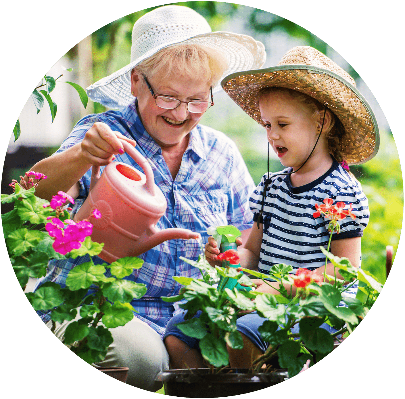 a person and a child watering flowers